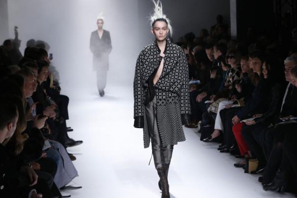 Models present creations for Haider Ackermann during the Fall/Winter 2013-2014 ready-to-wear collection show. Photo: AFP