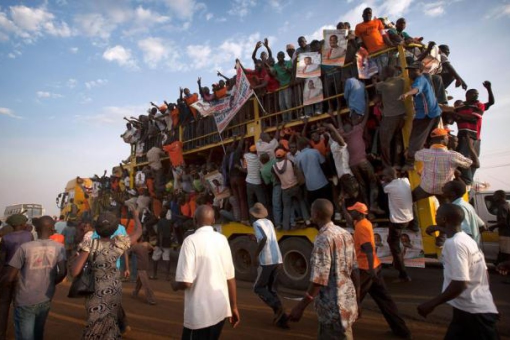 Supporters of Kenyan Prime Minister Raila Odinga travel home after a rally in Kisumu town. Photo: AFP