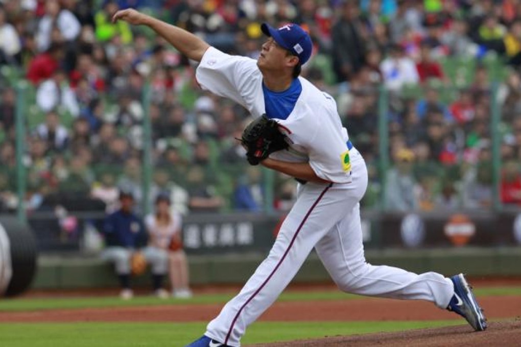 Wang Chien-ming threw six shutout innings. Photo: AP
