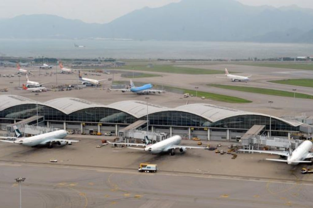 Frontline security staff at Chek Lap Kok airport will get a 4 per cent pay rise from next month. Photo: Xinhua