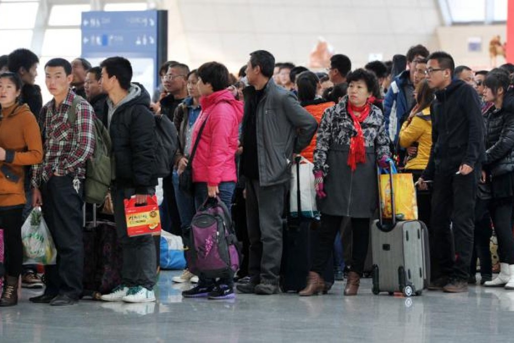 Despite spending years working in mainland cities, migrant workers still feel like outsiders. Photo: Xinhua