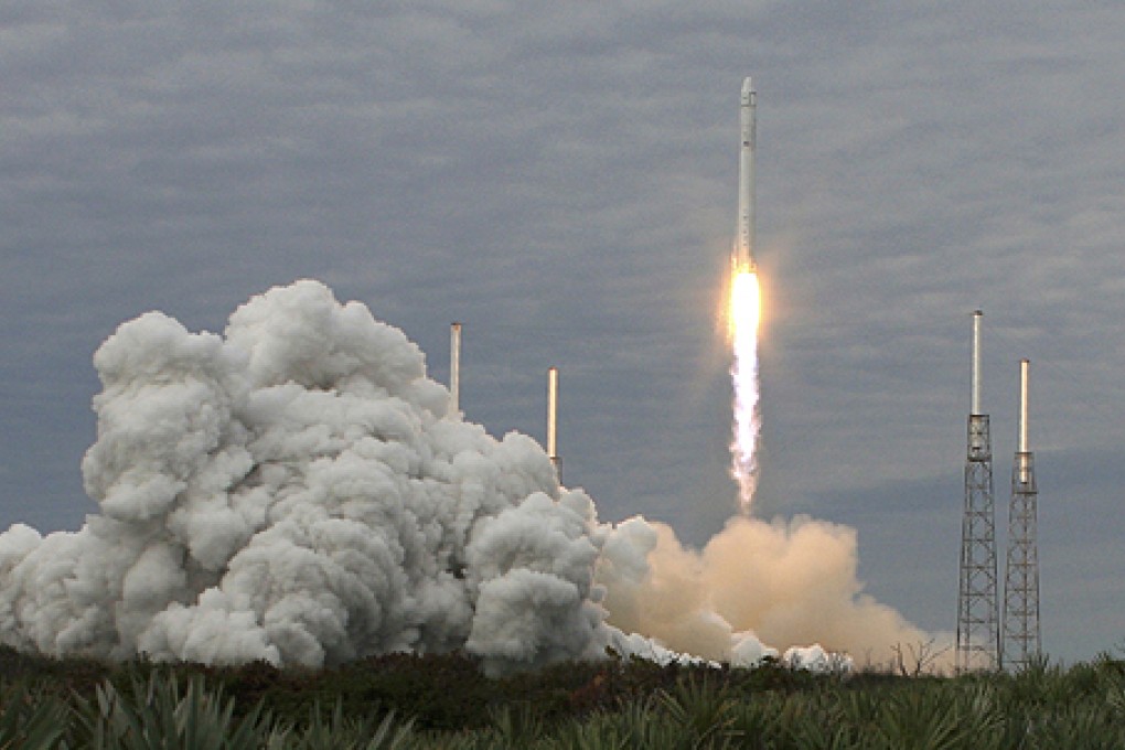 The SpaceX Falcon 9 rocket with the Dragon capsule, lifts off from the Cape Canaveral, Florida, on Friday. Photo: Reuters