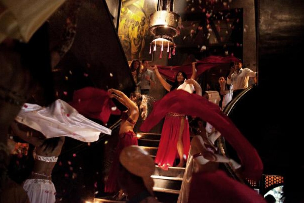 Le Comptoir is a wildly fun bar complete with gyrating belly-dancers and a live band. Photo: Andreas Holm