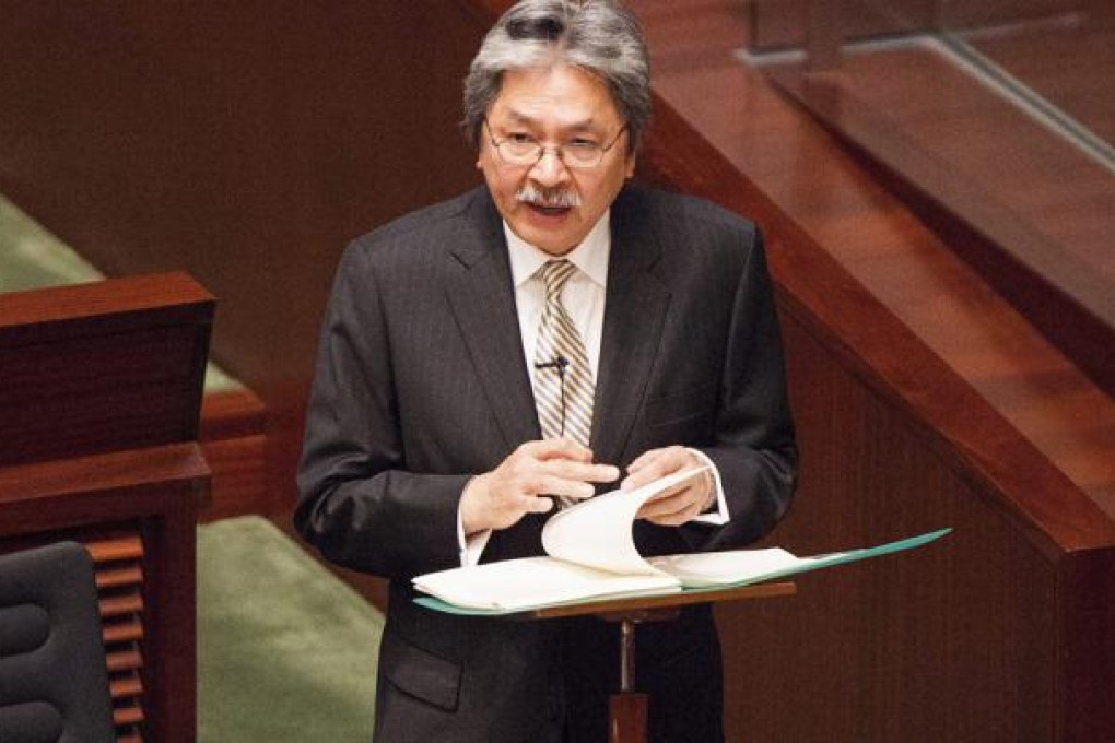 Financial Secretary John Tsang Chun-wah claimed he was 'also middle class'. Photo: EPA
