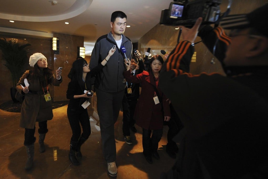 Former NBA player Yao Ming says he will continue to push sports development after attending the CPPCC session. Photo: Reuters