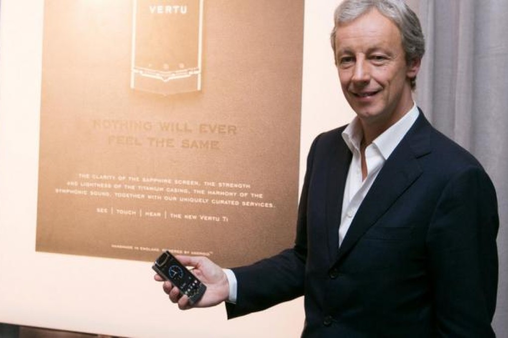 Perry Oosting, chief executive of Vertu, shows off the new Ti.