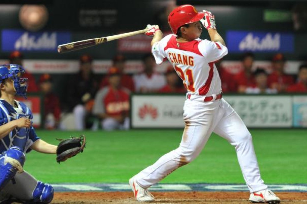 China shortstop Ray Chang hits a single during the eighth inning of their pool A first-round game against Brazil in the World Baseball Classic, which China won 5-2. Photo: AFP