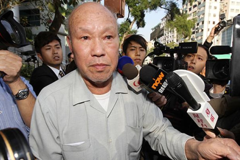 Builder Chu Wai-wing leaves Kowloon City Court on Wednesday after being fined HK$10,000 for his part in the Ma Tau Wai Road building collapse in 2010. Photo: Edward Wong