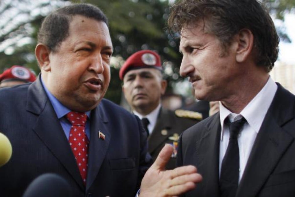 Hugo Chavez hosts Sean Penn on February 16, 2012. Photo: AP