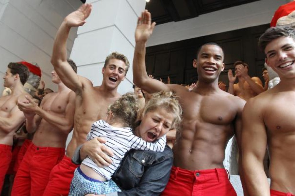 Male models gather for promotion at the new Abercrombie & Fitch flagship store in Hong Kong. Photo: Edward Wong