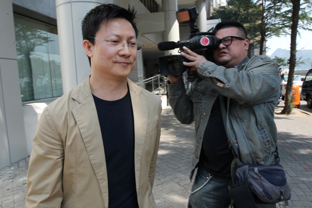 Ma Tat-man, whose T-shirt stall was severely destroyed in the Mong Kong blaze, leaves the inquiry at the Eastern Court. Photo: Nora Tam