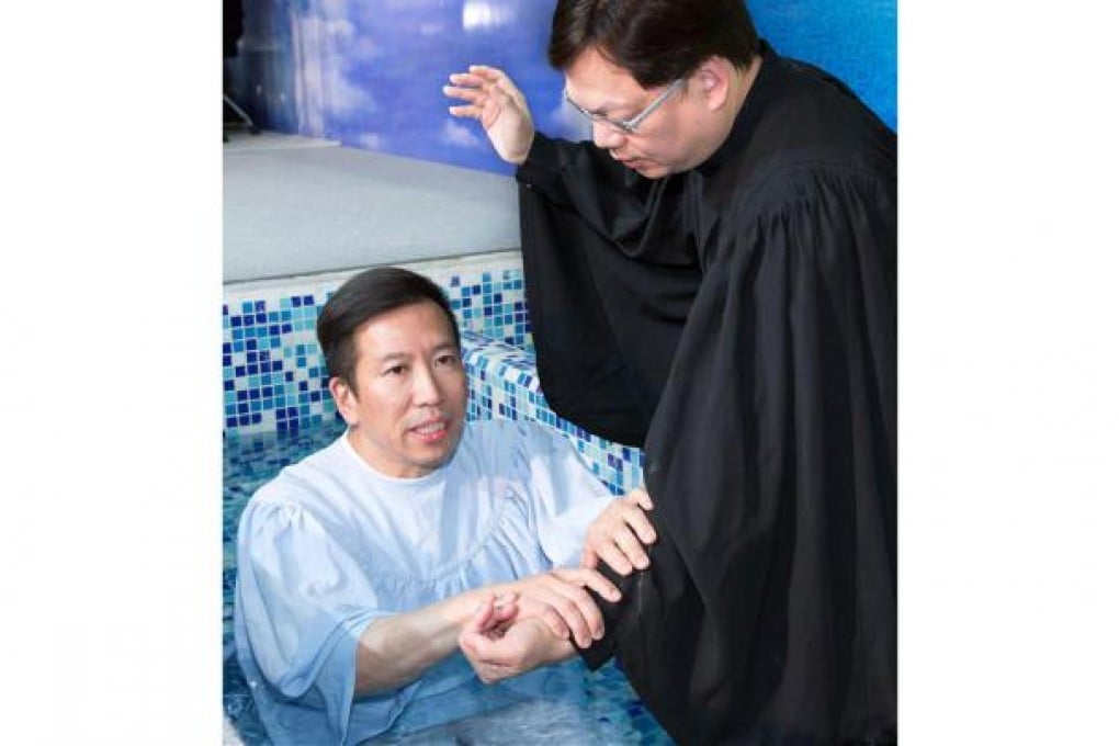 Former fung shui master Tony Chan is baptised by Pastor Lam Yee-lok at a church in Tsing Yi. The former adviser to late Chinachem billionaire Nina Wang faces charges of forging her will. He has renounced fung shui, saying it is the devil's work, and changed his name to Peter Chan to reflect his new belief. Photo: Crossroad Community Baptist Church