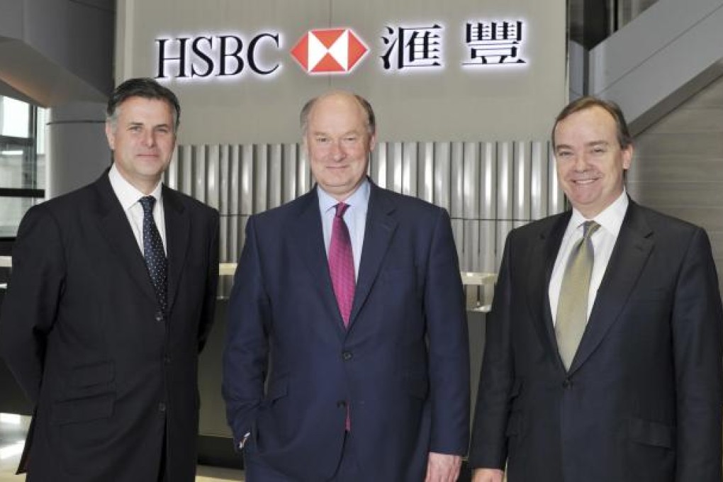 HSBC Group finance boss Iain Mackay, chair Douglas Flint and chief executive Stuart Gulliver.