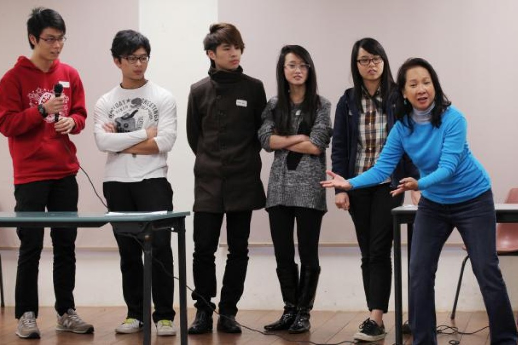 HKU medical students practise role play under the guidance of Lynn Yau (right) of the Absolutely Fabulous Theatre Connection. Photo: Paul Yeung