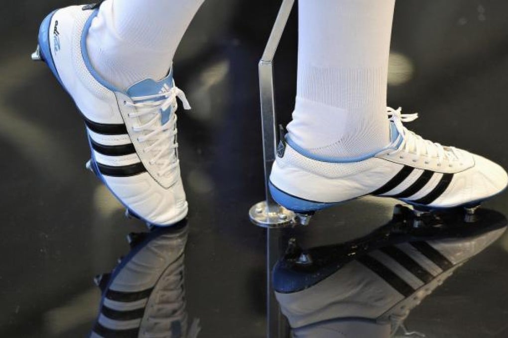 German sportswear maker Adidas plans to have its shops in 1,400 cities across the mainland by 2015. Photo: Bloomberg