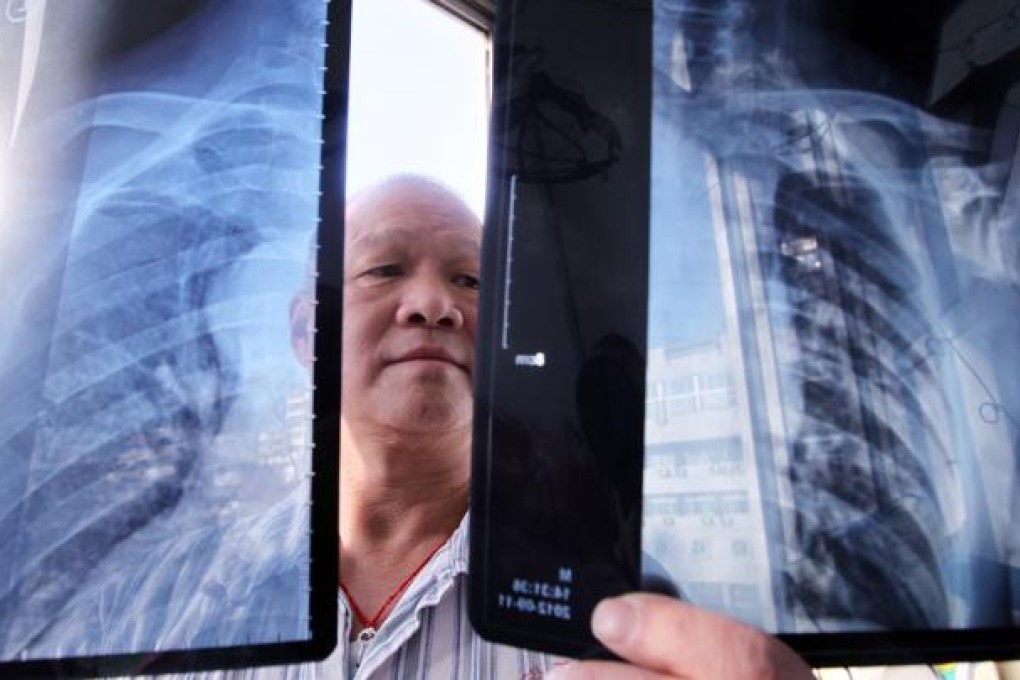 Fang Bo, infected by Sars in 2003, visits a hospital in Beijing. Photos: China Foto Press; Simon Song