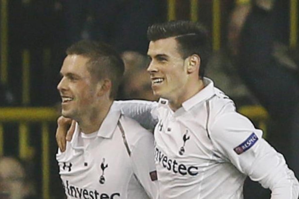 Gylfi Sigurdsson (left) and teammate Gareth Bale