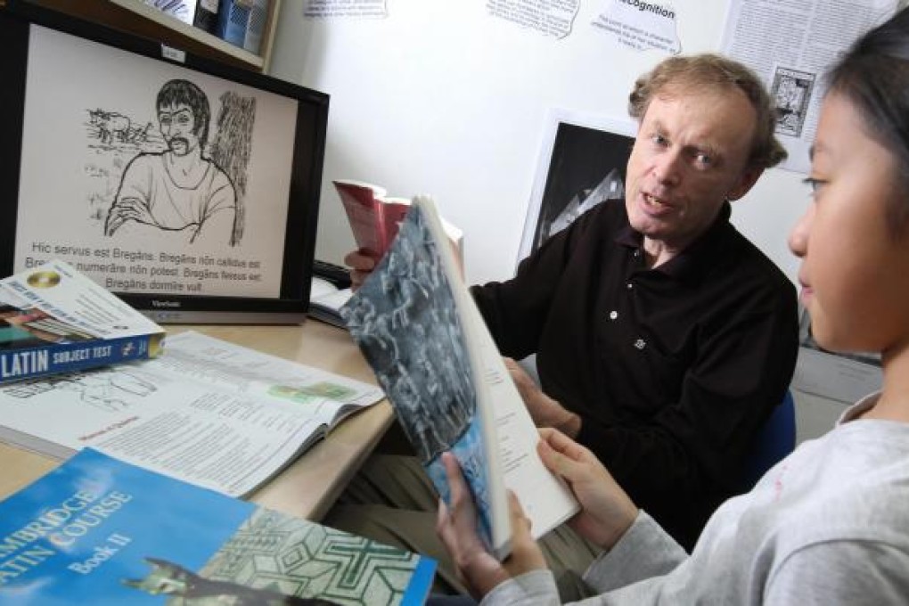 John Whelpton teaches one of his Latin students, Ashley Chan. Photo: Dickson Lee