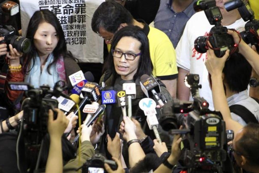 Yang Kuang meets supporters and the media after arriving at Hong Kong's airport. Photo: Felix Wong