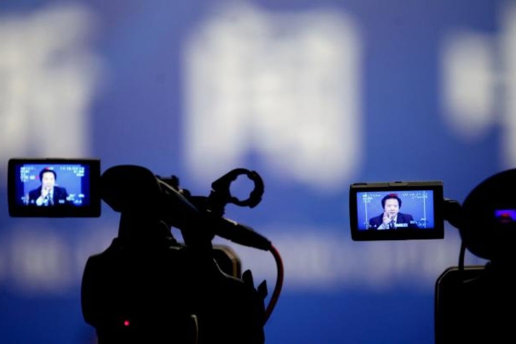 Wang Feng defends the work of the National Development and Reform Commission. Photo: Simon Song