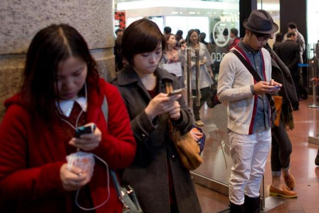 The city's big mobile network operators have warned of increased service degradation if they lose part of their 3G spectrum. Photo: Bloomberg