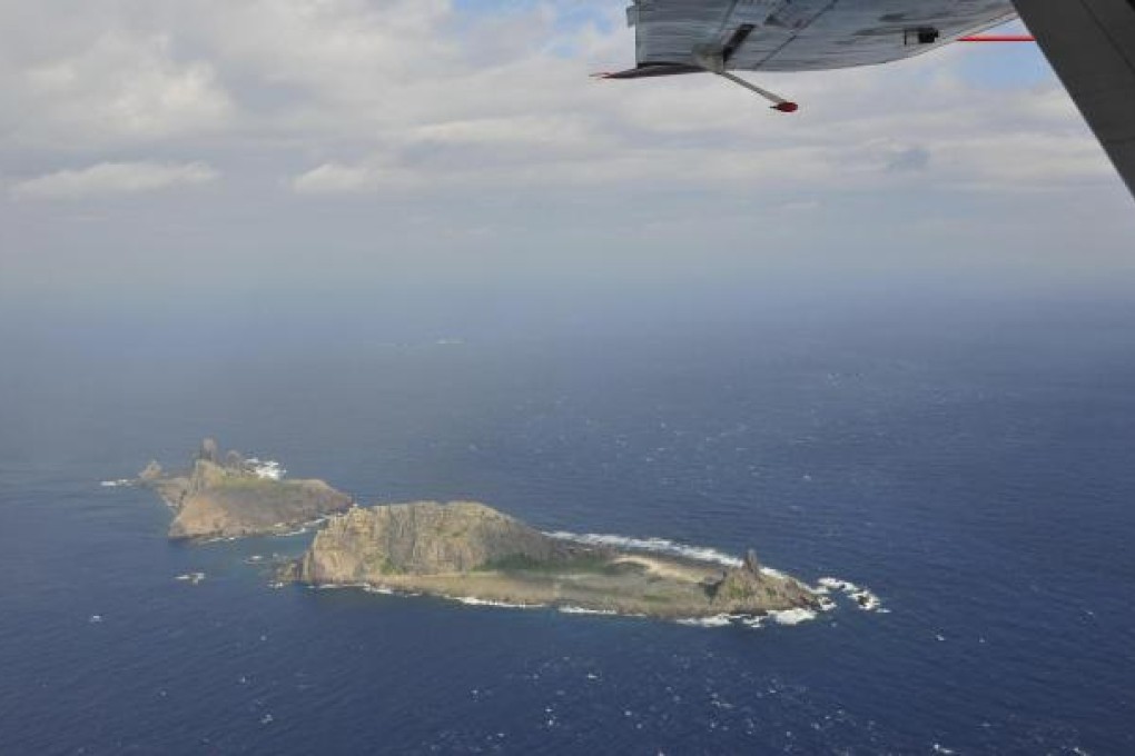 A view from a Chinese B-3837 marine surveillance plane shows the disputed Diaoyu Islands claimed by China and Japan. Photos: Reuters