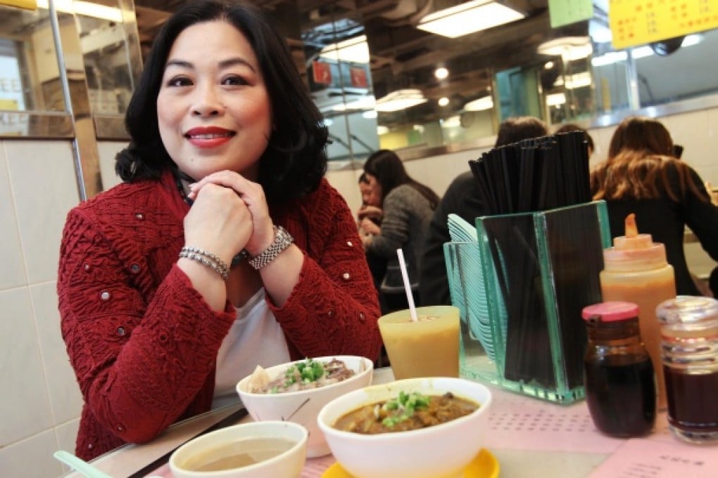 Foodie TV host Michelle Loo is ready to tuck into her beef brisket noodles at the Kau Kee restaurant in Sheung Wan.