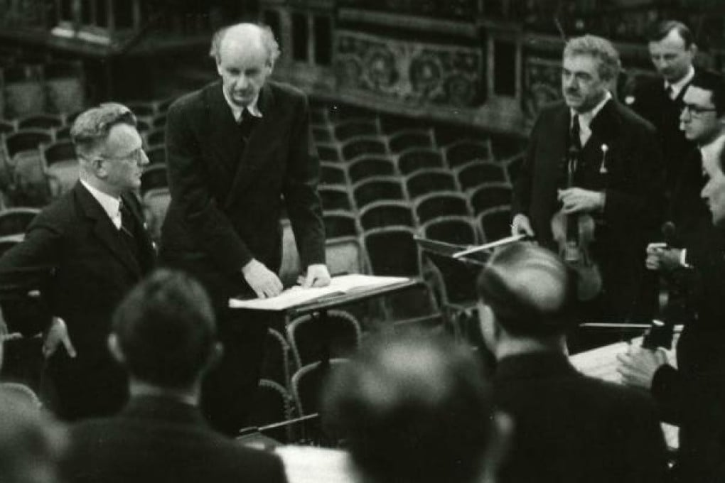 Austrian governor Arthur Seyss-Inquart (left) stands by Wilhelm Furtwaengler and musicians, in 1938 in Vienna. Photo: AFP