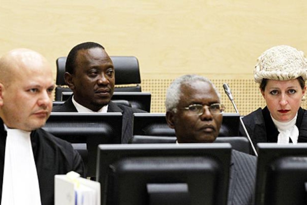 Uhuru Kenyatta (second left) and Francis Muthaura (second right) attend a hearing at the International Criminal Court in The Hague in 2011. Photo: AFP