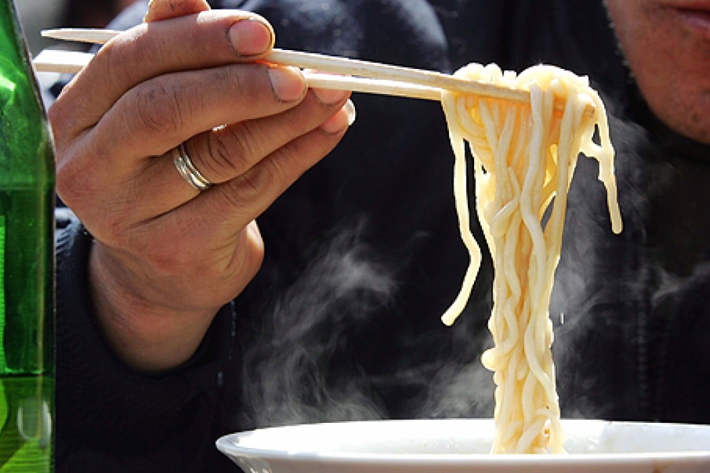 Jilin Forest Industry's chief blames people's eating habits for the mass production of disposable chopsticks. Photo: AP