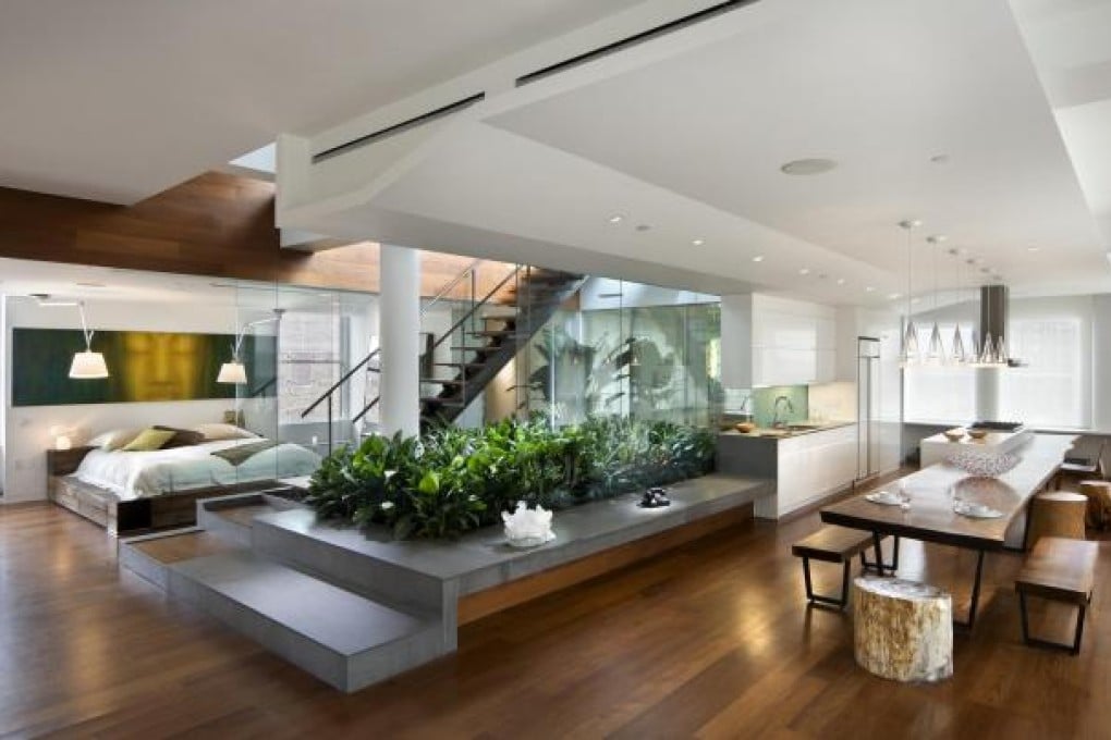 This penthouse loft in Manhattan's Nolita section has a central light well and a garden, designed by Joel Sanders. Photo: Joel Sanders Architect