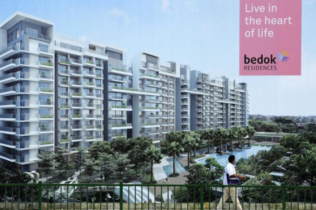 A billboard for a new project in Singapore, which in recent years has put much more emphasis on providing green features. Photo: Bloomberg