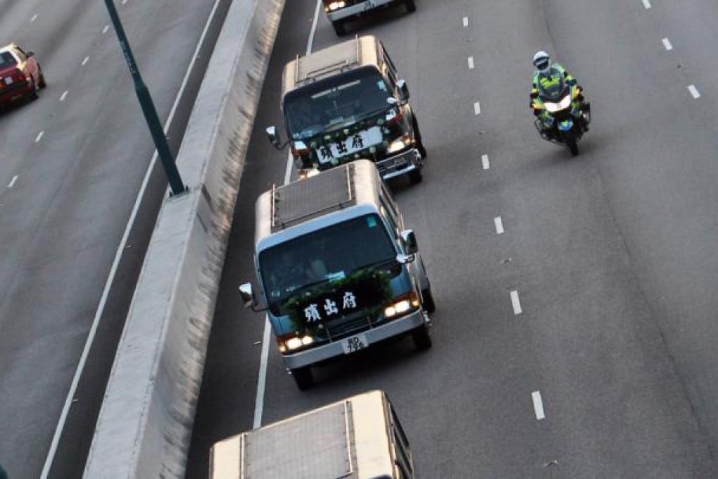A motorcade escorted by police from Hong Kong International Airport to the Kwai Chung Public Mortuary carries the bodies of the nine Hongkongers who died in last month's ballooning accident in Egypt. Hong Kong police say they will investigate the accident, in which 19 people died in Luxor on February 26. Photo: David Wong
