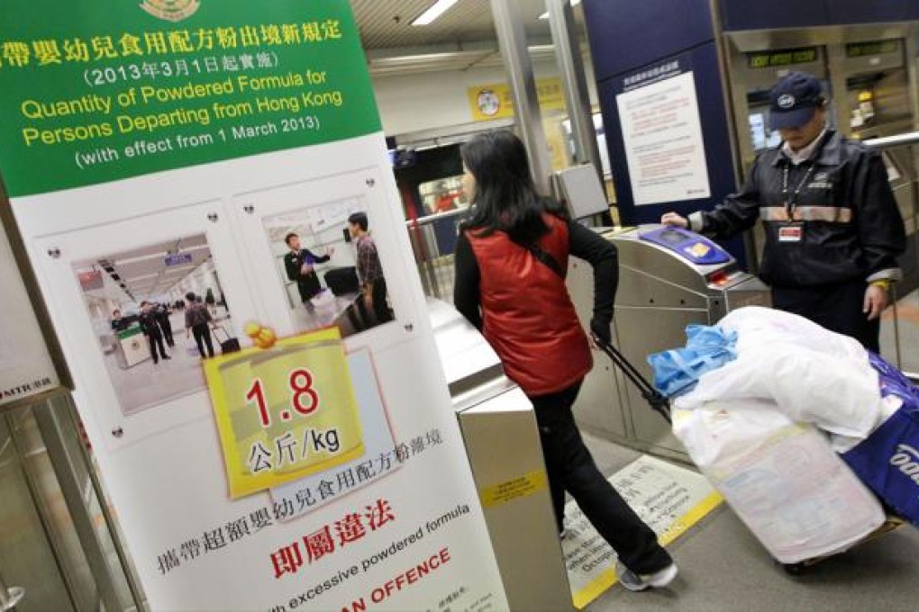 Travellers who ride the MTR with their packaged infant milk formula must now undergo security checks at Sheung Shui station. Photo: Felix Wong