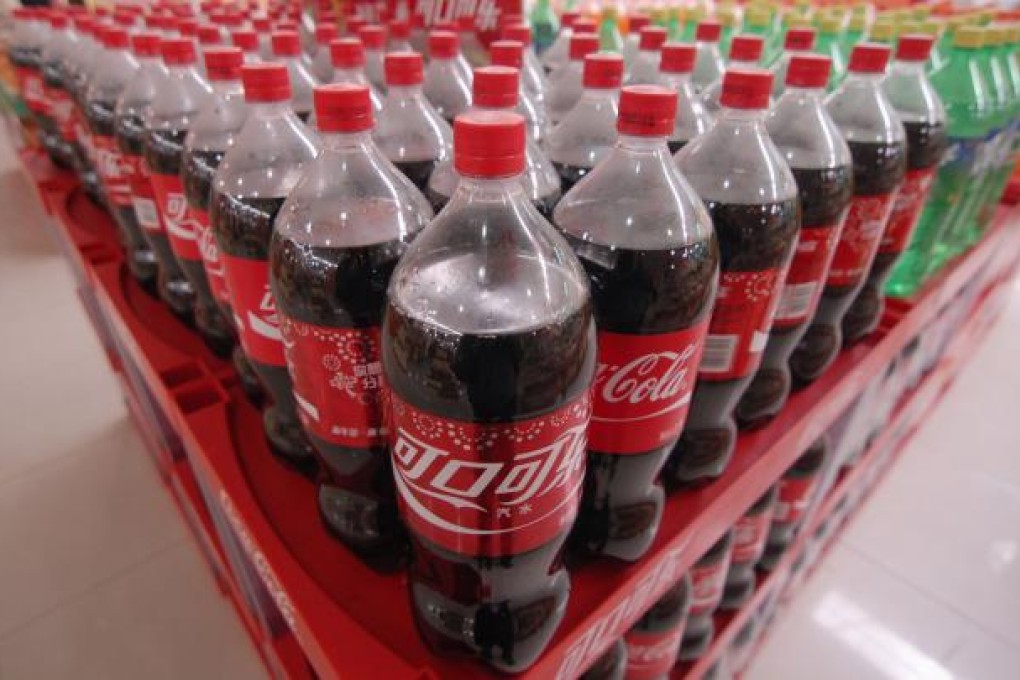 Chinese officials are accusing Coke of using handheld GPS equipment to illegally gather classified information. Photo: Reuters