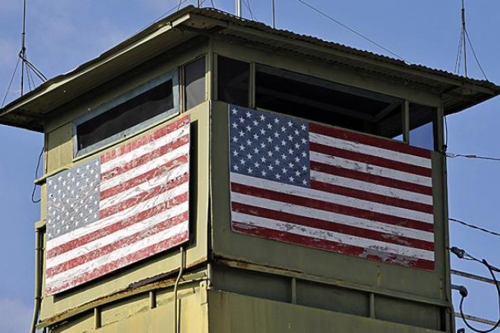 A guard tower overlooks the northeast gate at US Guantanamo Bay Naval Base. Photo: Reuters
