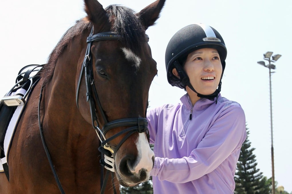 Vicky Tang with one of her retired horses, Noble Boss. Photo: May Tse
