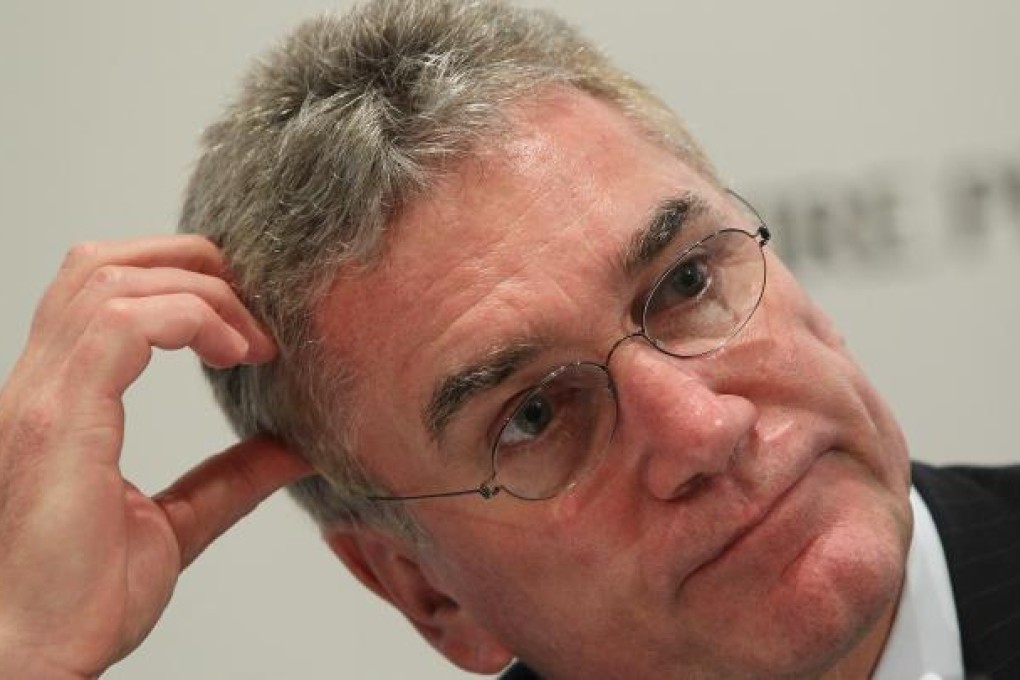 Swire Pacific chairman Christopher Pratt said earnings fell almost 50 per cent in 2012, largely because of a slowdown that hit Cathay Pacific Airways, which Swire Pacific controls. Photo: SCMP