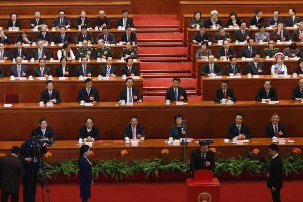New Premier Li Keqiang unveils his new cabinet team as the National People's Congress plenary approaches its conclusion.