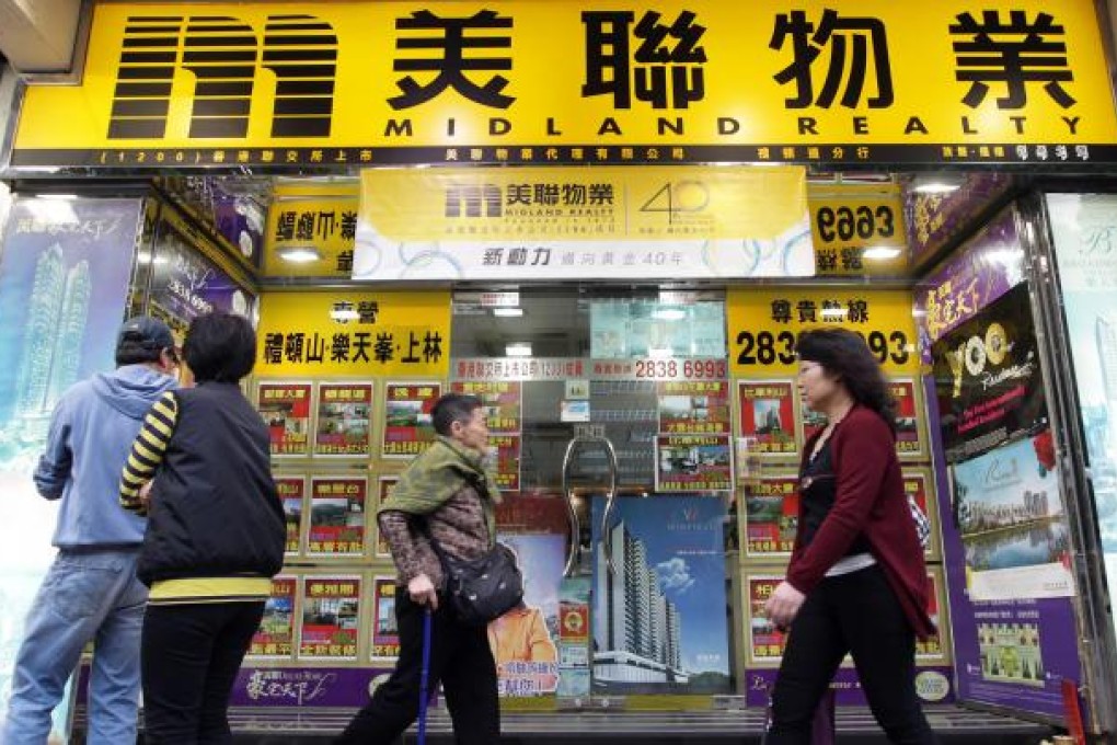 A Midland branch in Happy Valley. The property agency says the industry is heading for hard times as sales decline. Photo: Jonathan Wong