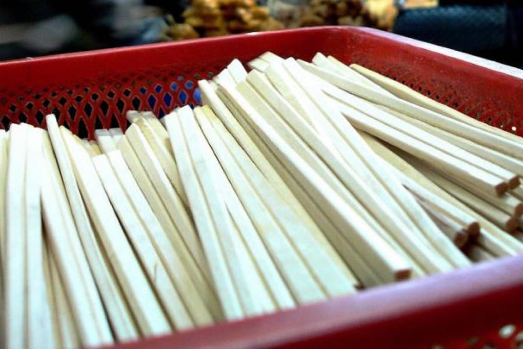 Disposable wooden chopsticks are seen at a restaurant. Photo: Xinhua