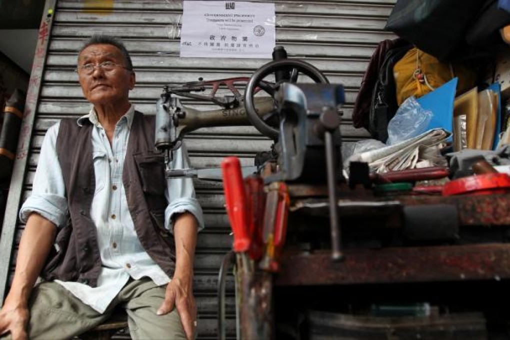 Cobbler Ho Kei-sing, 74, was not among those offered the option to bid for a market unit as his business is located just outside Yan Shun Lane. Photo: Nora Tam