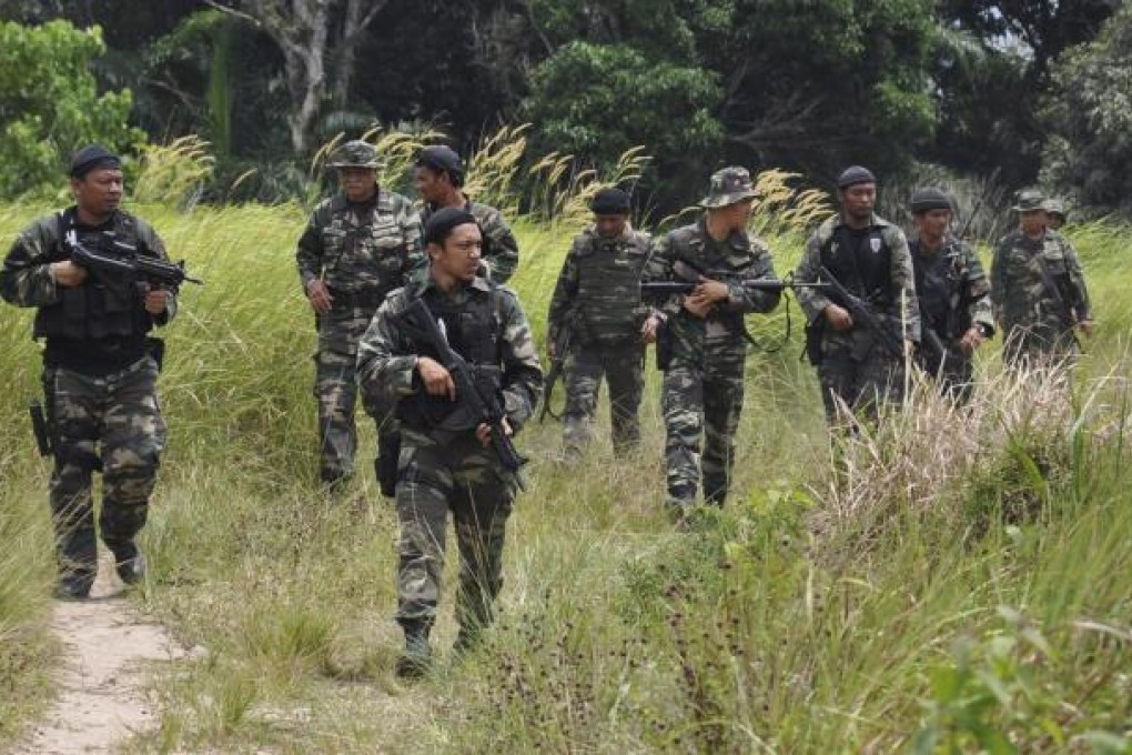 Malaysian soldiers patrol Sabah, on Borneo. Photo: EPA