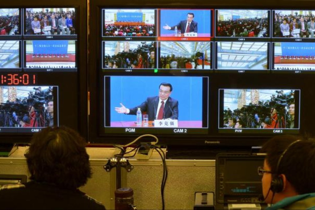 Journalists from around the world covered Li Keqiang's first news conference as premier. Photo: Xinhua