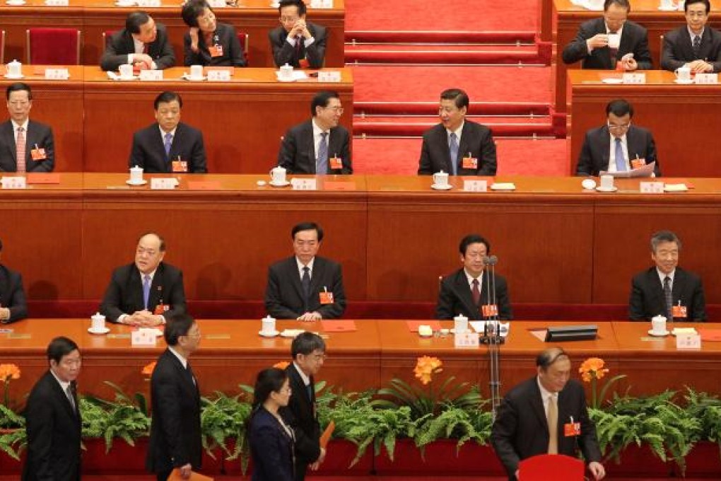 The new lineup of China's State Council, nominated by Premier Li Keqiang, was endorsed by lawmakers at a NPC meeting at the Great Hall of the People in Beijing. Photo: Simon Song