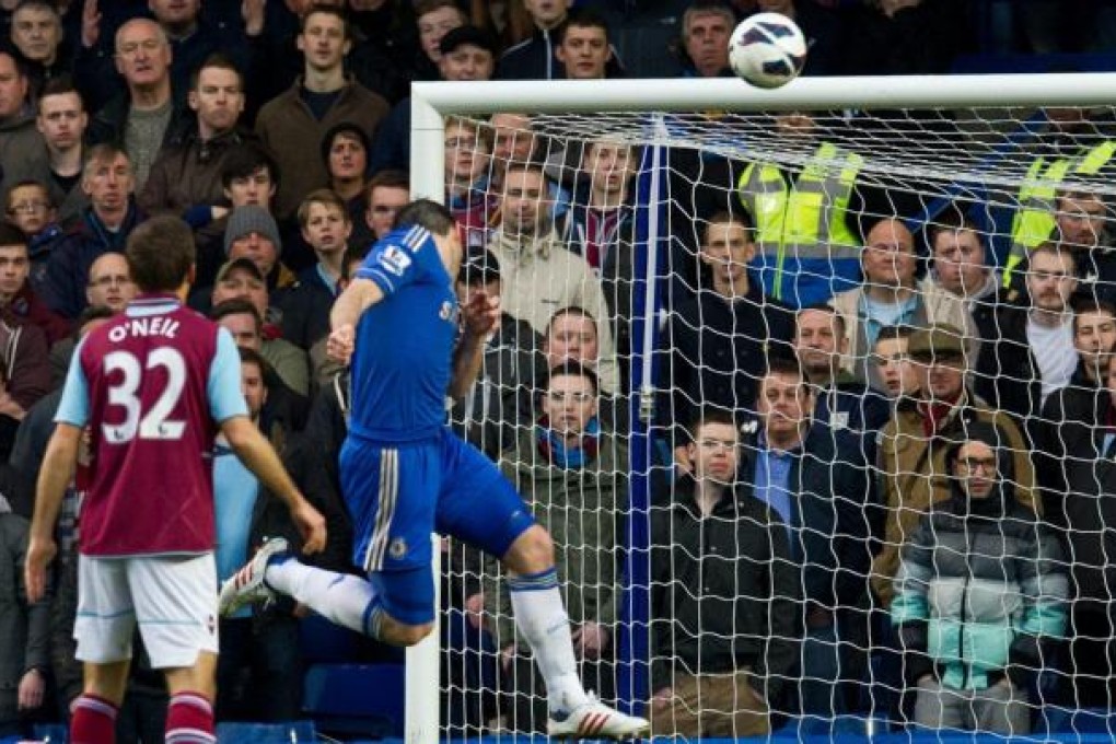 Frank Lampard notches up the double century. Photo: EPA
