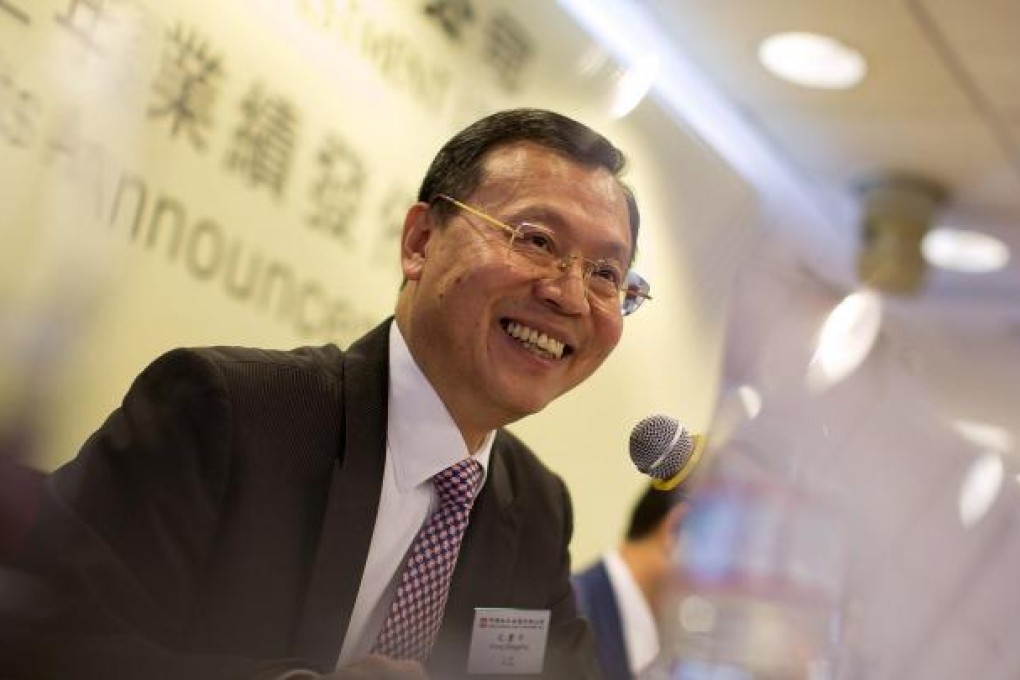 Kong Qingping, chairman of China Overseas, says tough measures will remain in place for some time in the property market. Photo: Bloomberg