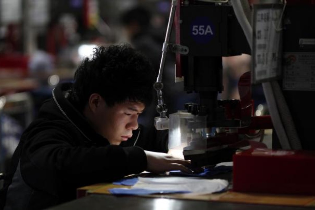 China should create jobs and boost wages, says International Monetary Fund deputy managing director Zhun Min. Photo: Reuters