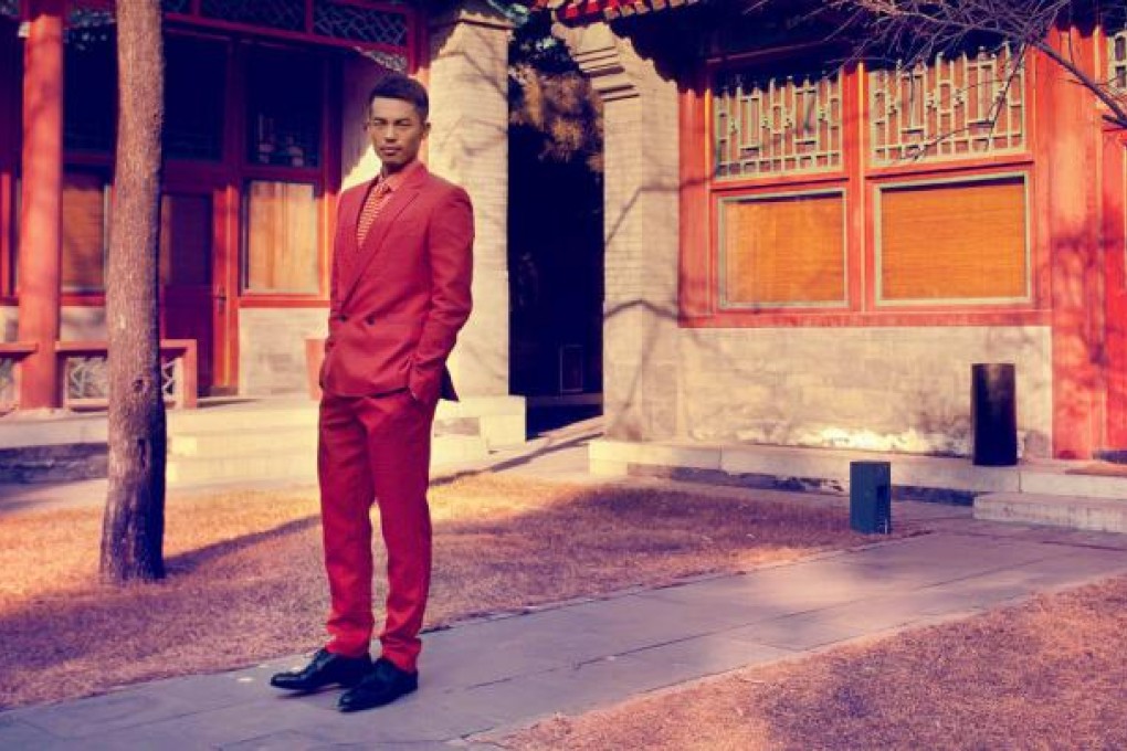 'Now I am able to help others, especially kids,' says the world's greatest badminton player, Lin Dan, at Aman, at Summer Palace, in Beijing.