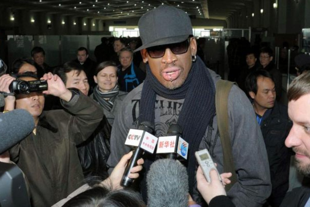 Former NBA star Dennis Rodman speaks to the media at the Pyongyang Airport. Photo: AP